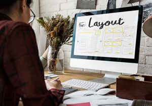 Ocean County web design professional working on layout